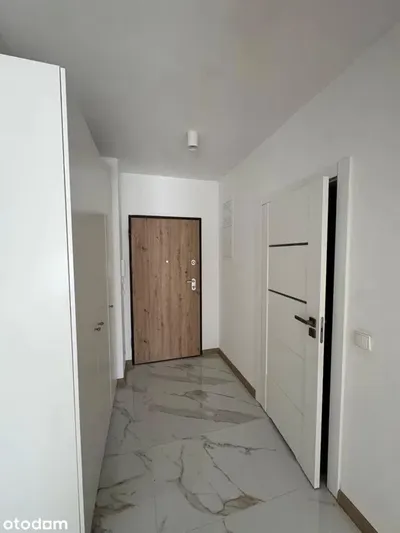 Mieszkanie dwupokojowe 40 m² z miejscem parkingowym - miniatura 3