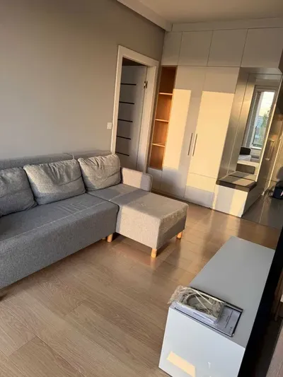 mieszkanie do wynajęcia z miejscem postojowym i komórką lokatorską Kraków Wrocławska New York Residence - 2 pok. i salon z aneksem kuchennym