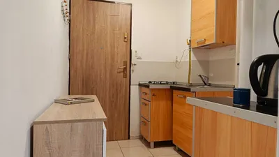 Kawalerka w centrum – 6. piętro, piękny widok na miasto - miniatura 4