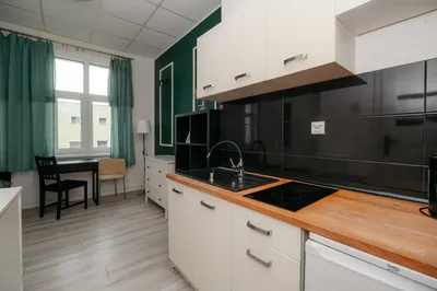 jasna kawalerka w centrum miasta - ulica Łokietka - miniatura 4